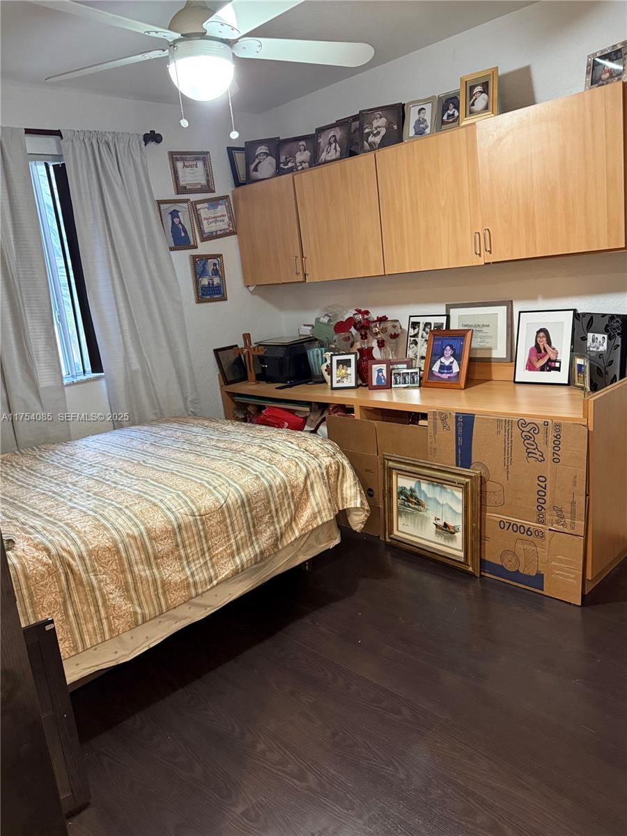 16618 Southwest 68th Terrace Miami, FL 33193 - Photo 24 of 34 a bedroom with bed and a window