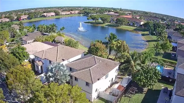 an aerial view of a house with a garden