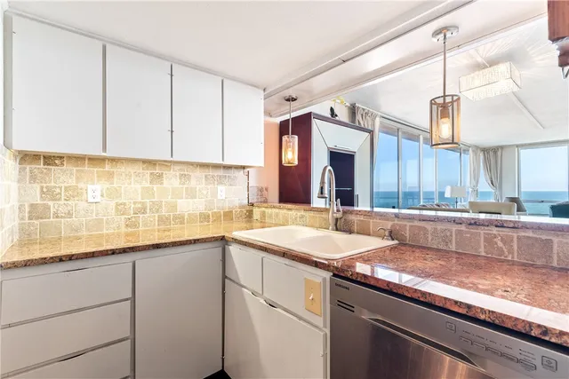 a workspace room with furniture and wooden floor