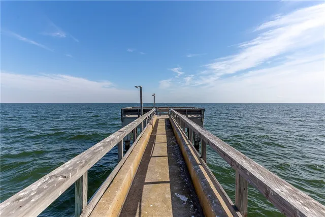 a view of a lake from a balcony