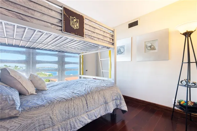 a bed room with a bed and a window