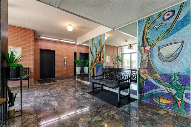 a view of a potted plant in front of a door
