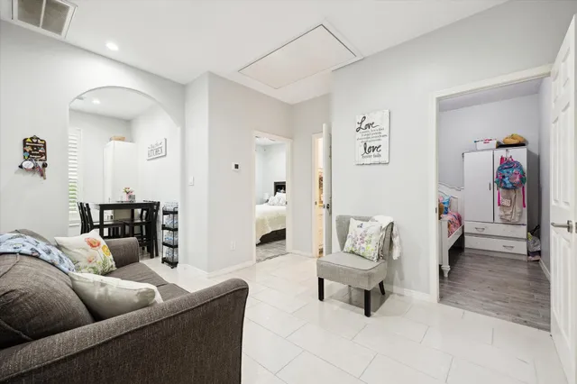 a living room with furniture and a couch