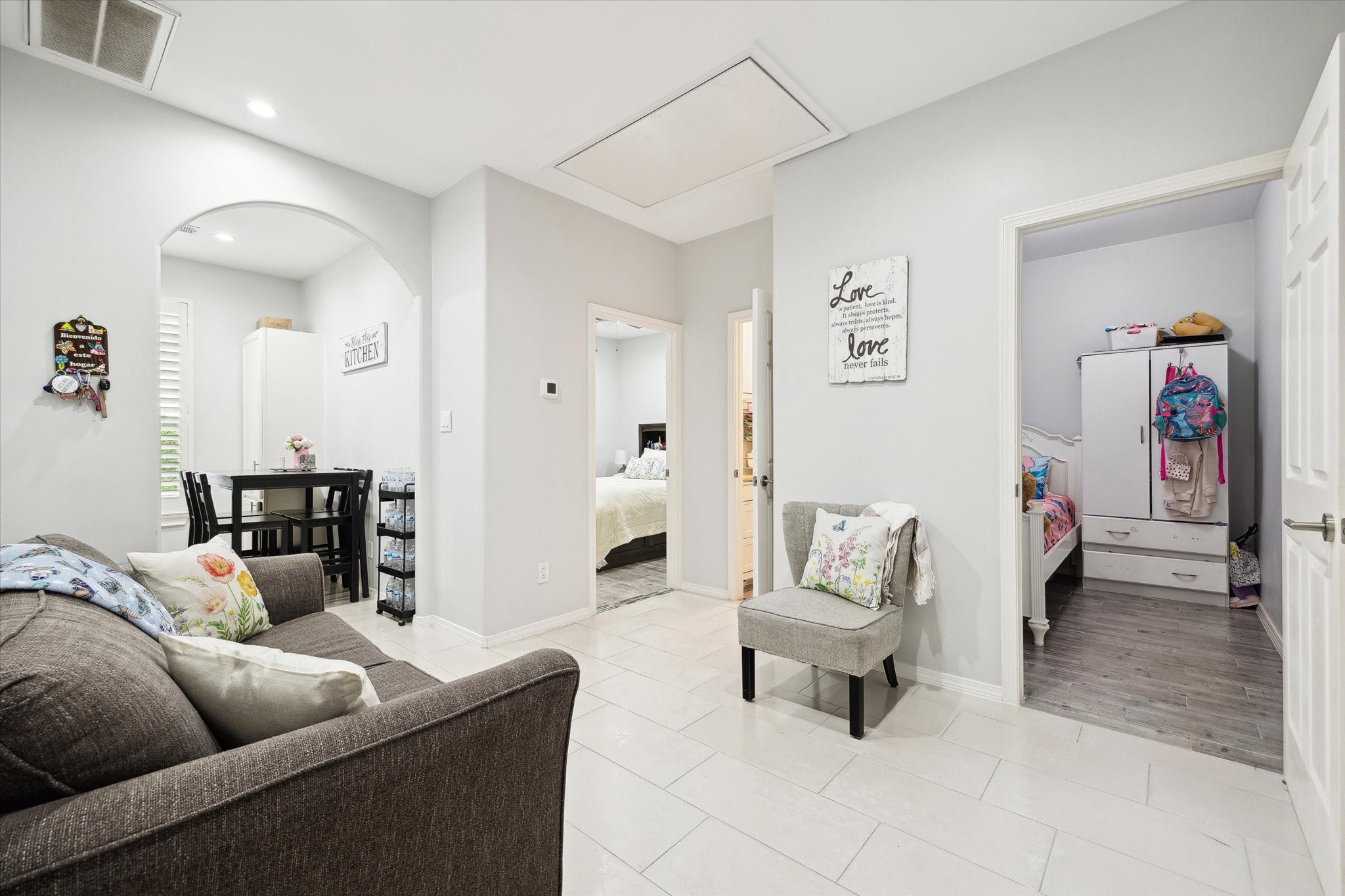 8917 Hawk Road Pearland, TX 77584 - Photo 23 of 33 a living room with furniture and a couch