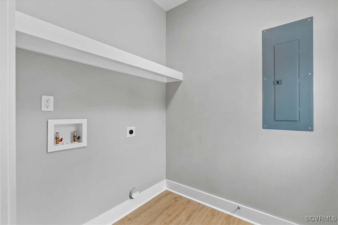 292 Lunenburg County Road Keysville, VA 23947 - Photo 21 of 39 Laundry area with hardwood / wood-style floors, el
