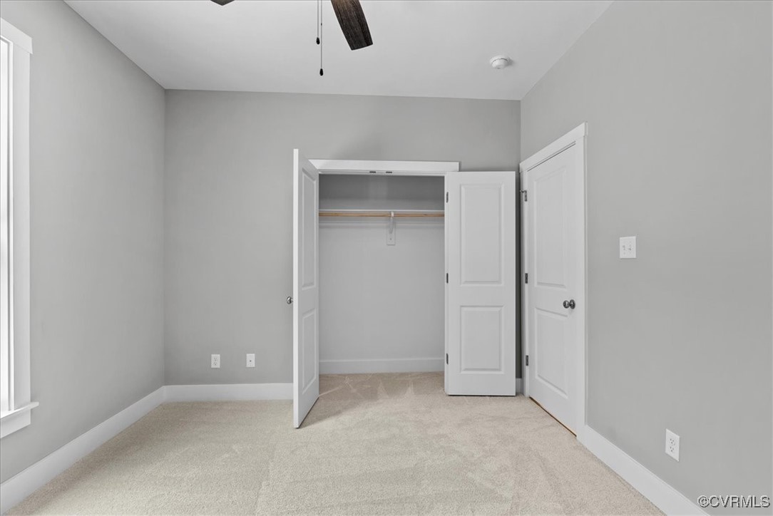 292 Lunenburg County Road Keysville, VA 23947 - Photo 32 of 39 Unfurnished bedroom featuring ceiling fan, light c