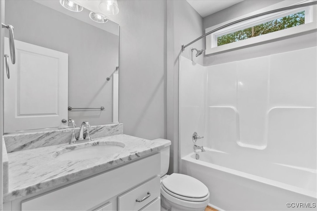 292 Lunenburg County Road Keysville, VA 23947 - Photo 33 of 39 Full bathroom featuring toilet, vanity, and bathtu