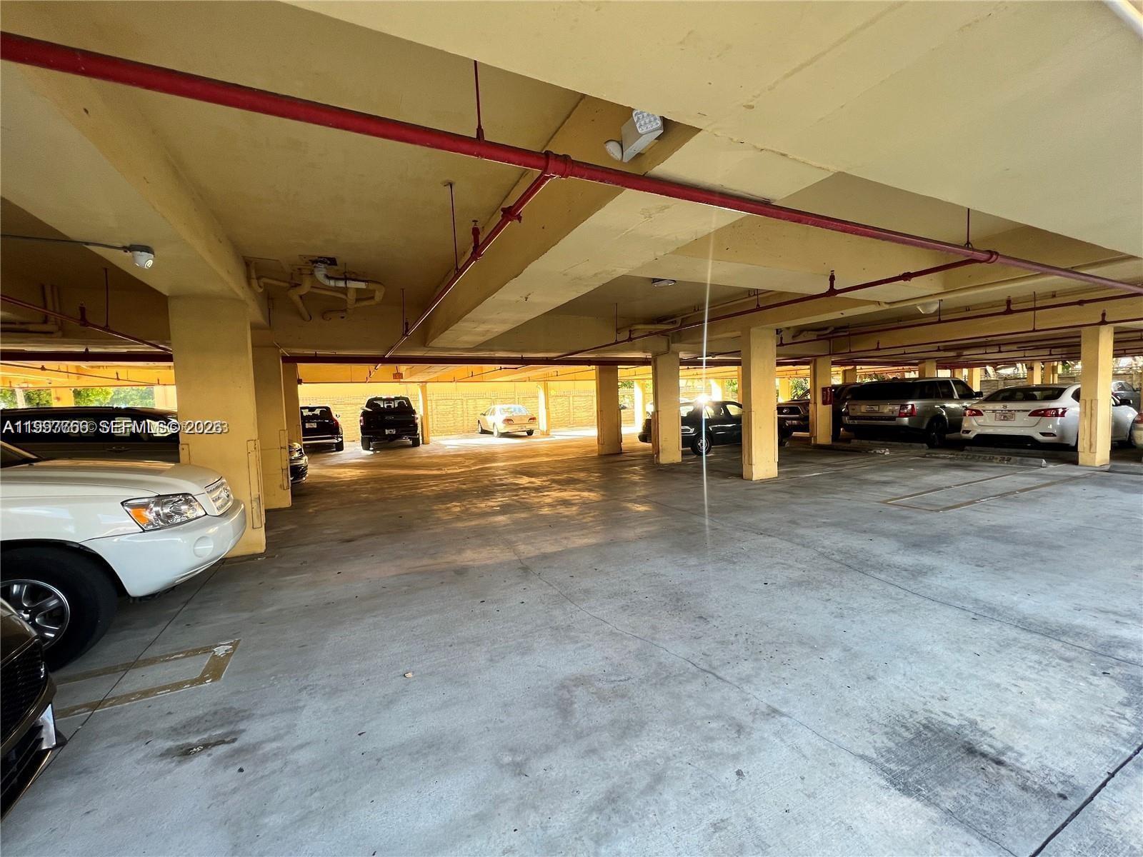 637 Southwest 3rd Street, Unit 306 Miami, FL 33130 - Photo 19 of 19 a view of a cars parking space