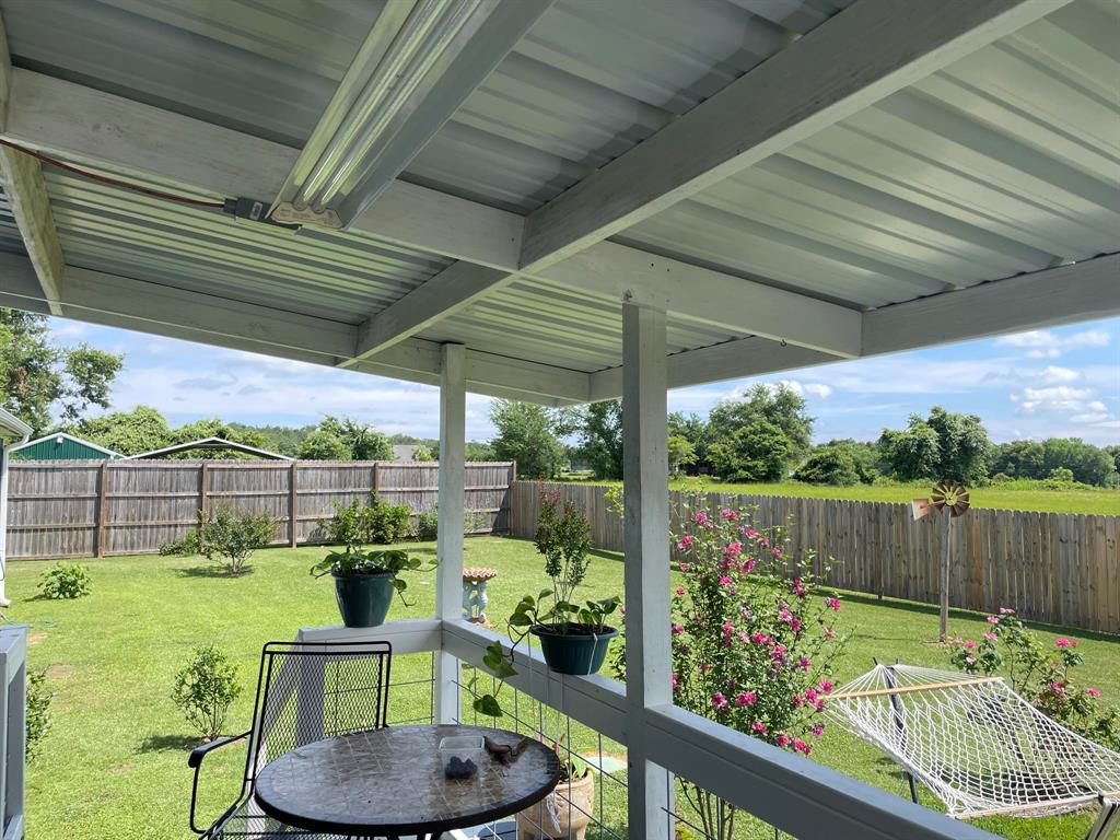 123 F County Road 411 Buffalo, TX 75831 - Photo 5 of 23 a garden view with a seating space