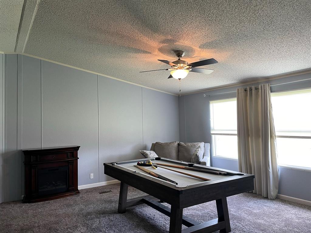 123 F County Road 411 Buffalo, TX 75831 - Photo 9 of 23 a view of a workspace with furniture