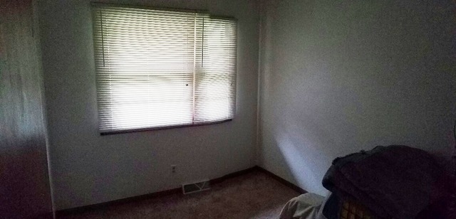 10543 East Flagg Road Rochelle, IL 61068 - Photo 12 of 17 an empty room with a window