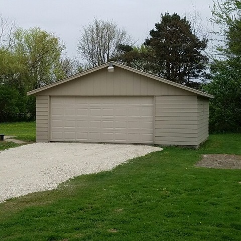 10543 East Flagg Road Rochelle, IL 61068 - Photo 13 of 17 a backyard of a house with lots of green space