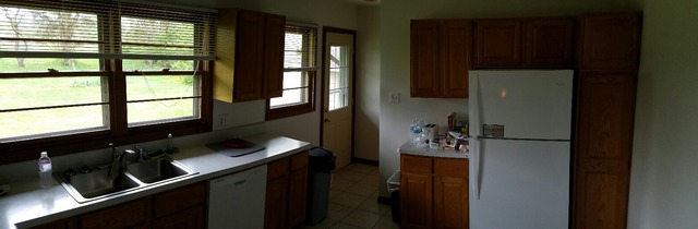 10543 East Flagg Road Rochelle, IL 61068 - Photo 5 of 17 a kitchen with a refrigerator and a stove
