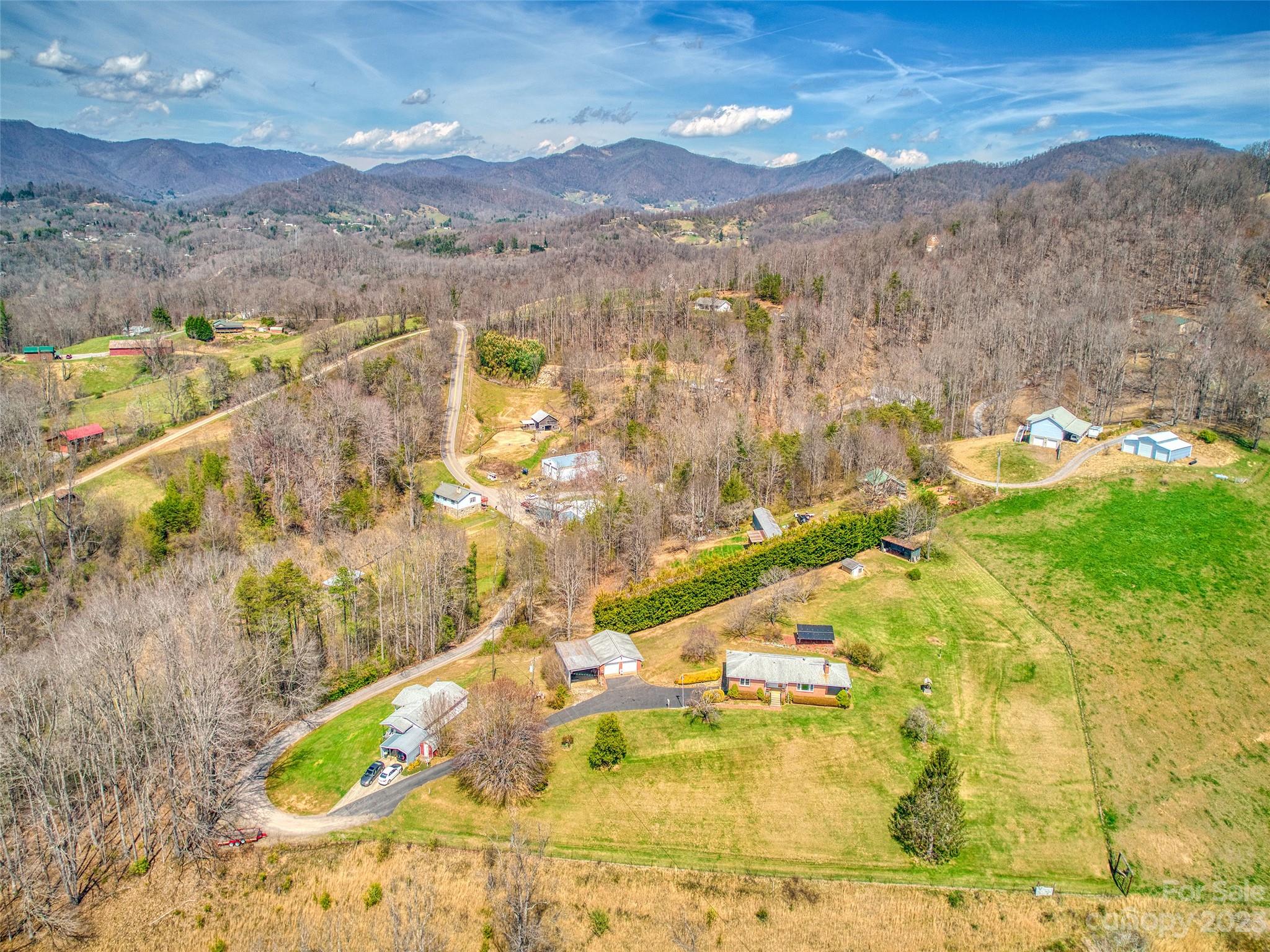 1310 Chestnut Mountain Road Canton, NC 28716 - Photo 7 of 47 a view of residential houses with outdoor space