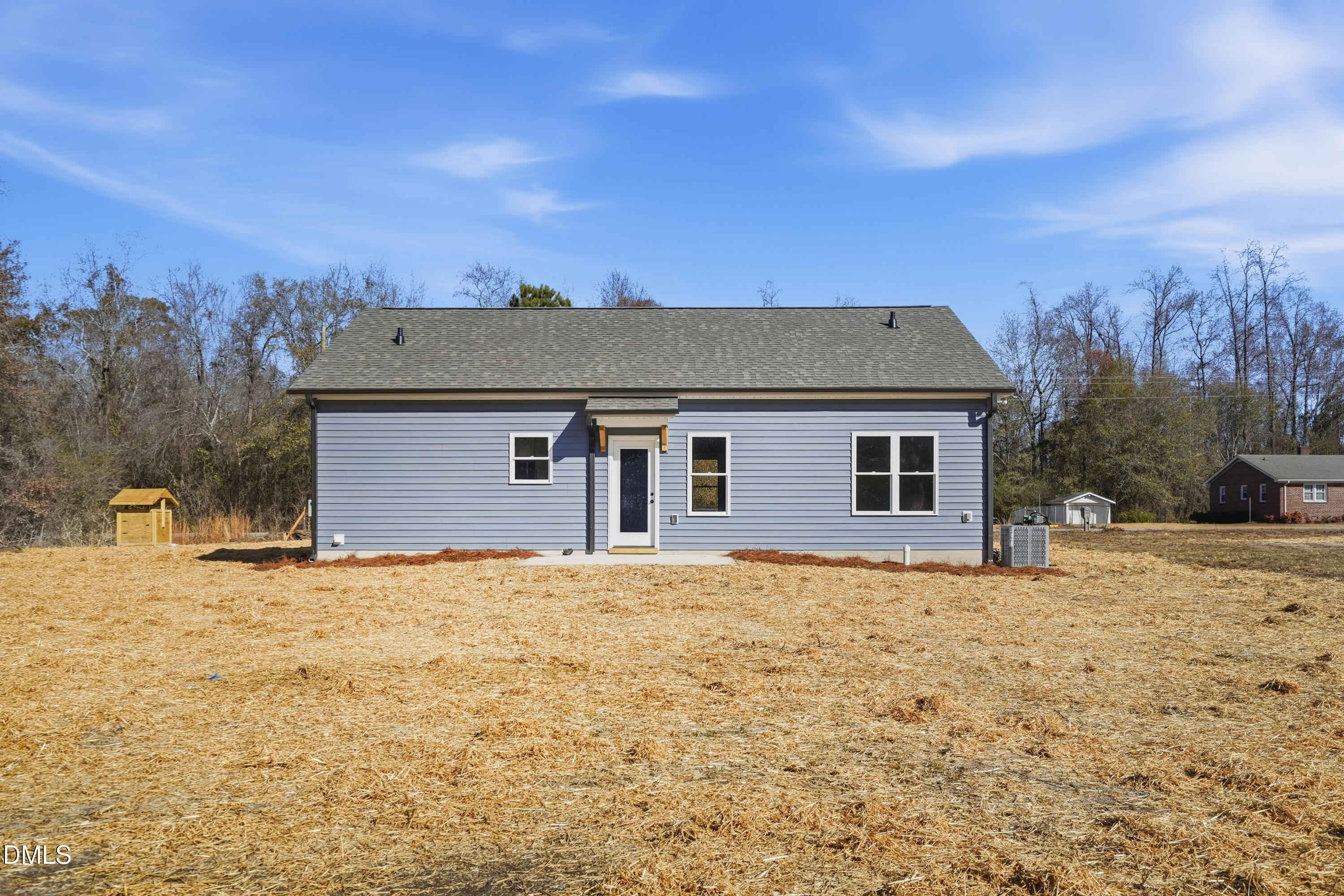 1115 Jada Allen Road Dunn, NC 28334 - Photo 29 of 32 a front view of a house with a yard
