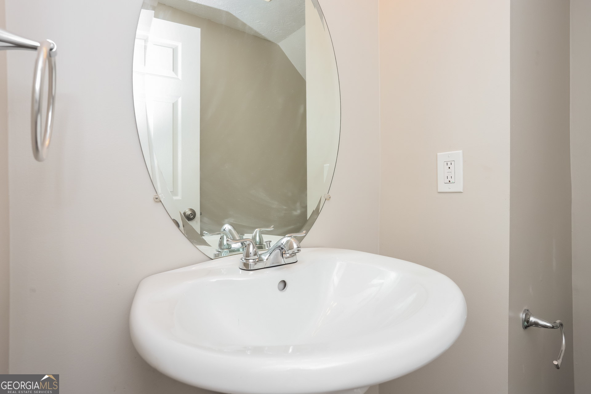 688 Windcroft Circle Northwest Acworth, GA 30101 - Photo 14 of 17 a bathroom with a sink and a mirror