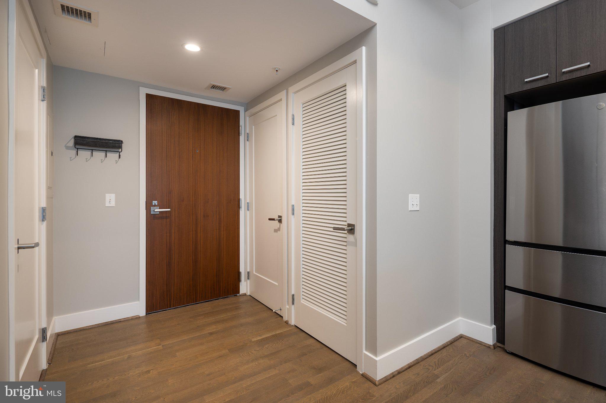 525 Southwest Water Street Southwest, Unit 404 Washington, DC 20024 - Photo 10 of 82 Modern entryway with sleek design.