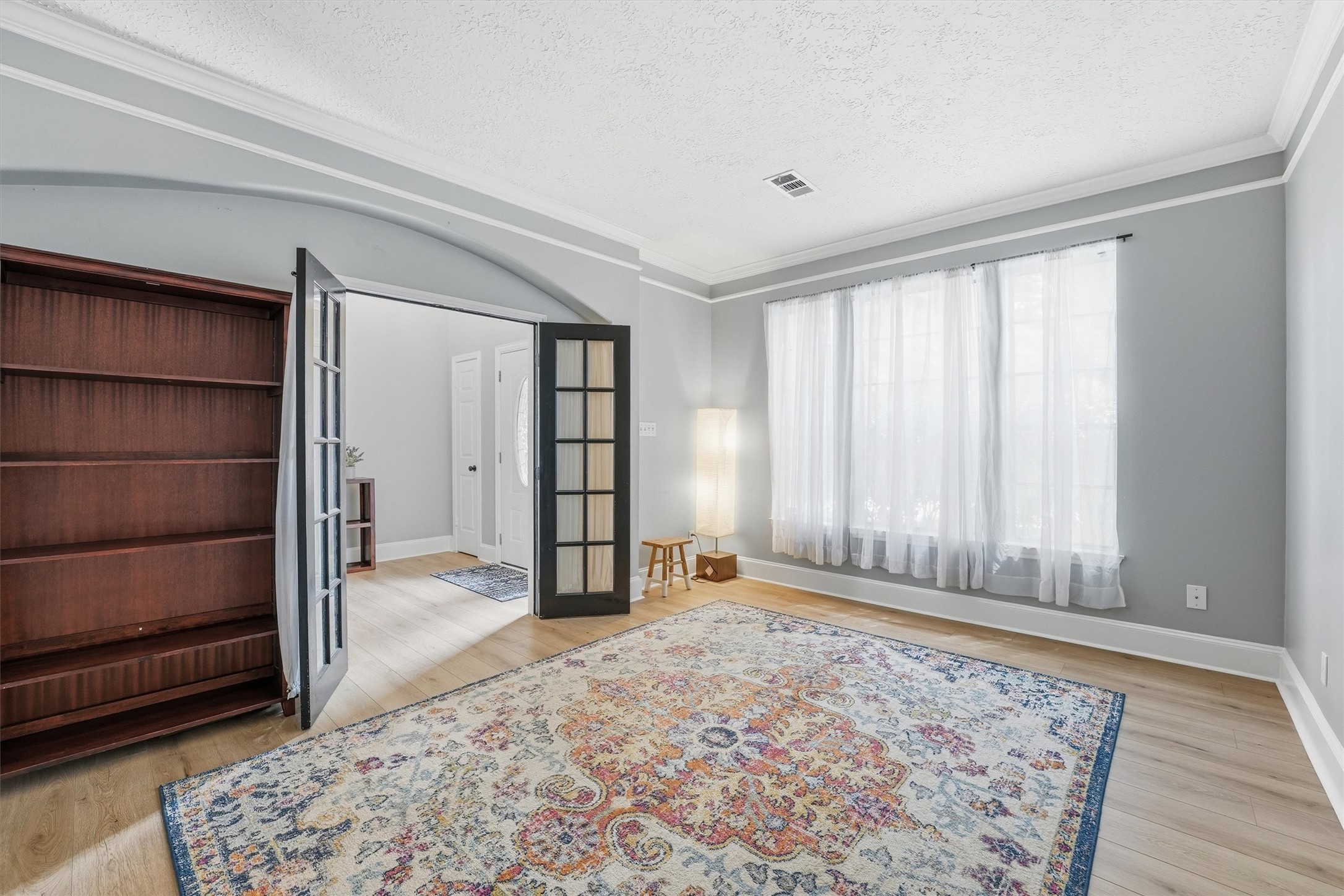 8827 Mile Run Road Humble, TX 77346 - Photo 7 of 37 an empty room with windows