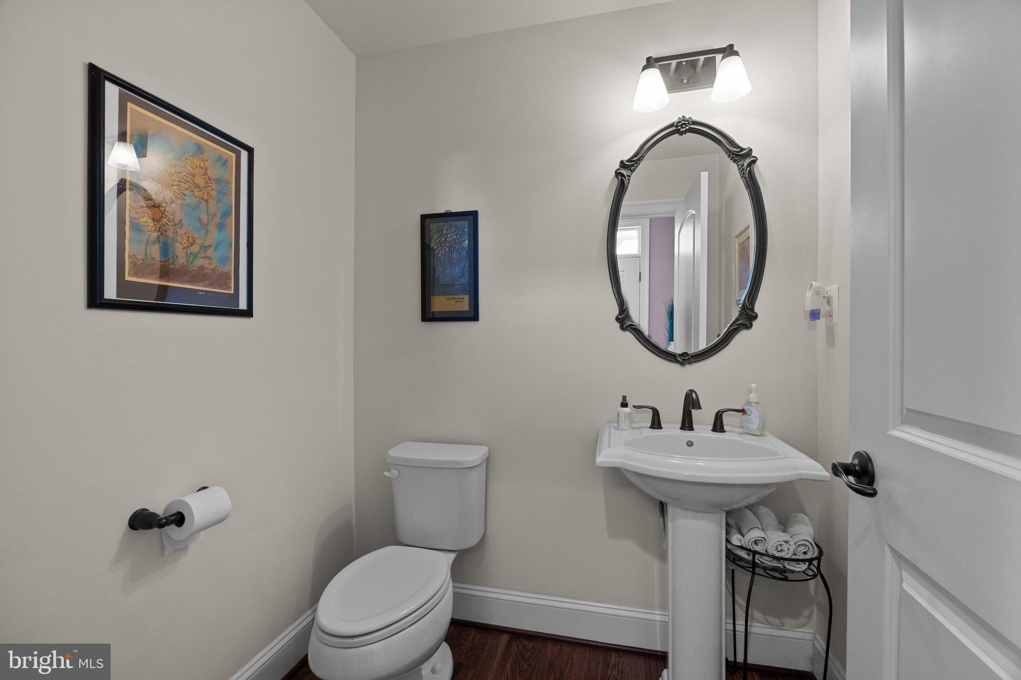 3842 Jacob Stout Road Doylestown, PA 18902 - Photo 14 of 68 a bathroom with a toilet a sink and a mirror