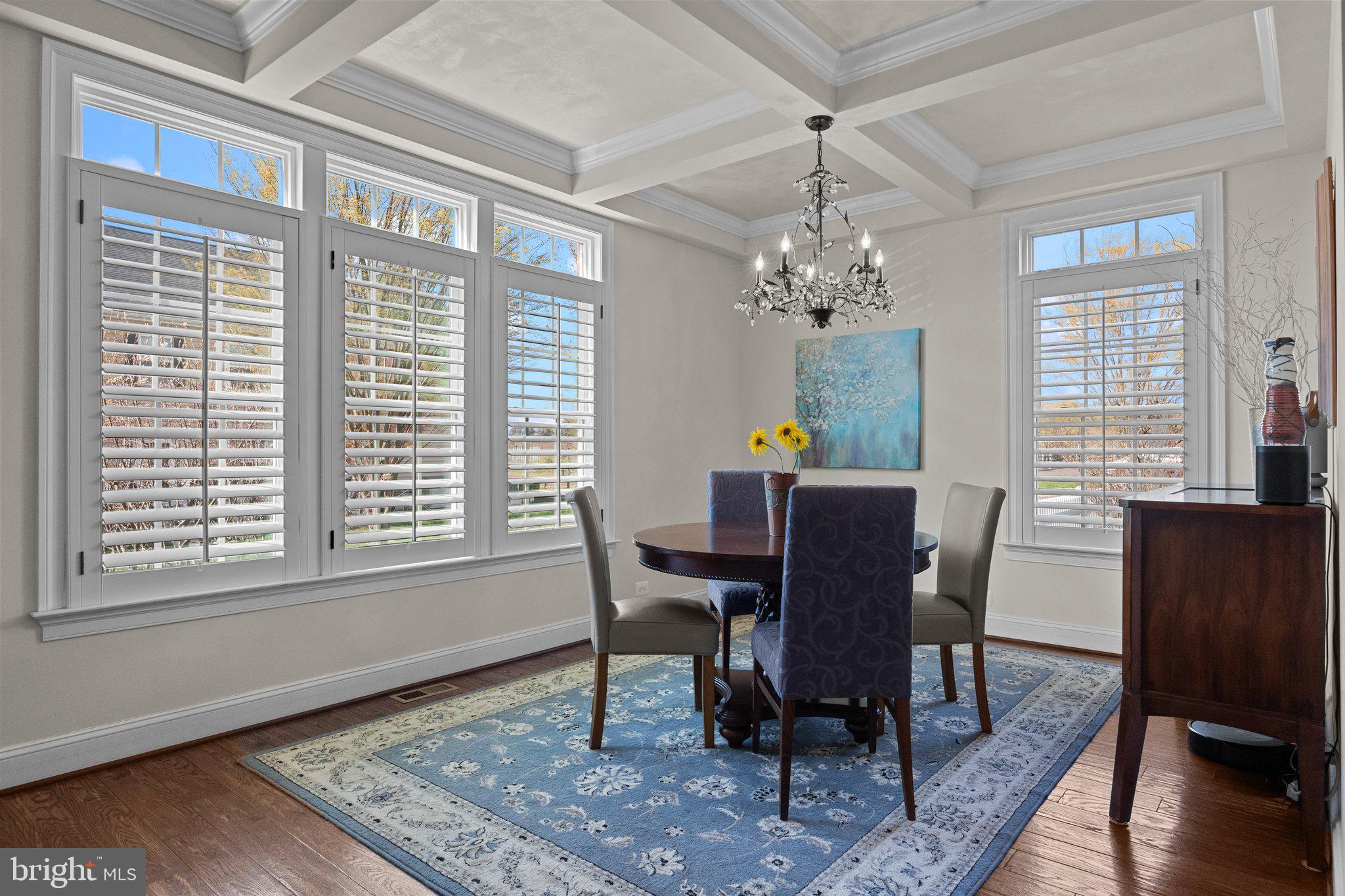 3842 Jacob Stout Road Doylestown, PA 18902 - Photo 15 of 68 a dining room with furniture a rug and a chandelier