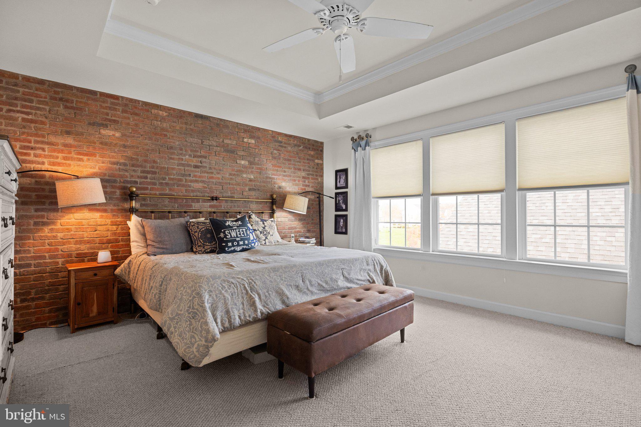 3842 Jacob Stout Road Doylestown, PA 18902 - Photo 18 of 68 a spacious bedroom with a bed and a chandelier