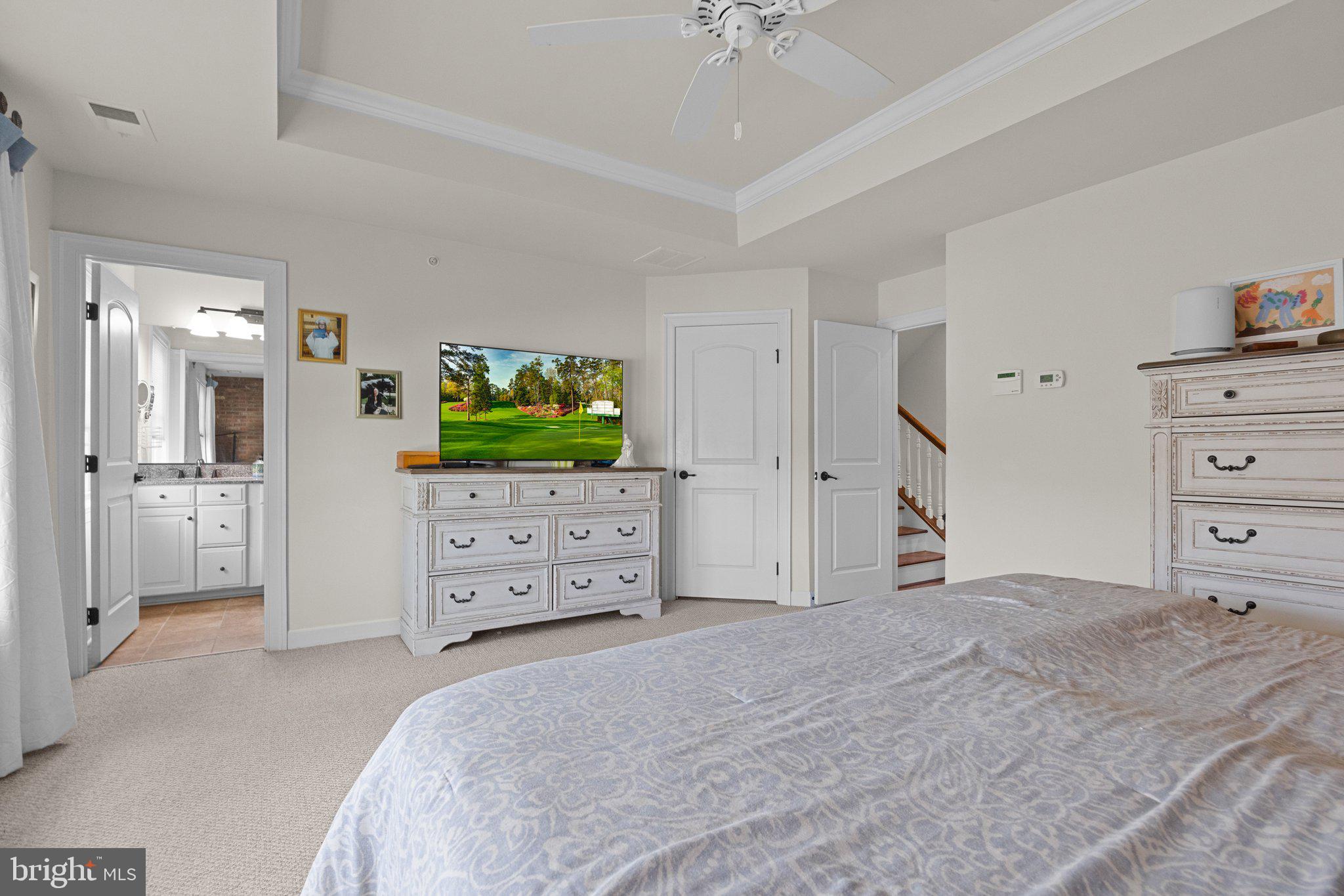 3842 Jacob Stout Road Doylestown, PA 18902 - Photo 19 of 68 a bedroom with a bed and a flat tv screen in it