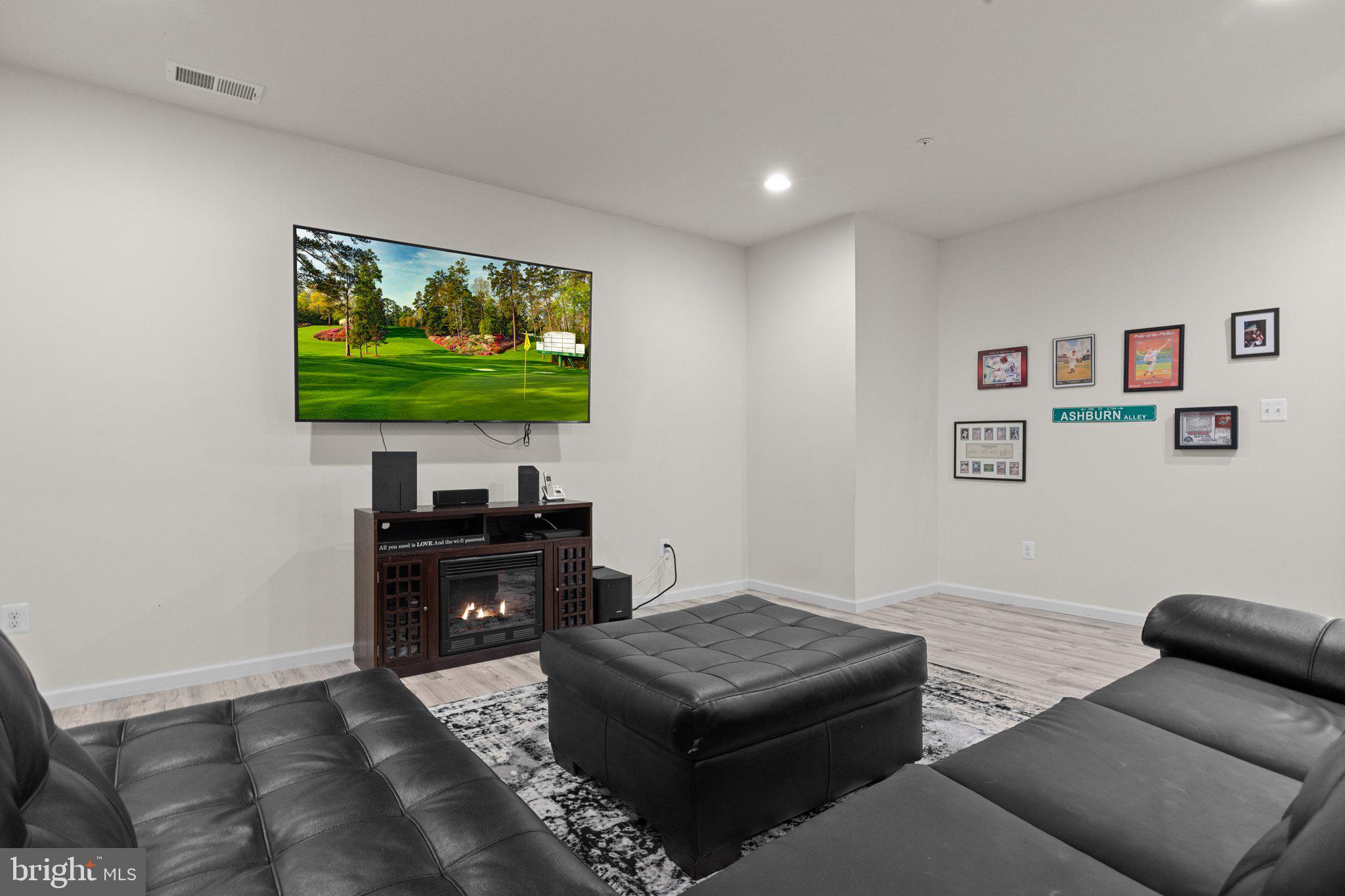 3842 Jacob Stout Road Doylestown, PA 18902 - Photo 37 of 68 a living room with furniture and a flat screen tv