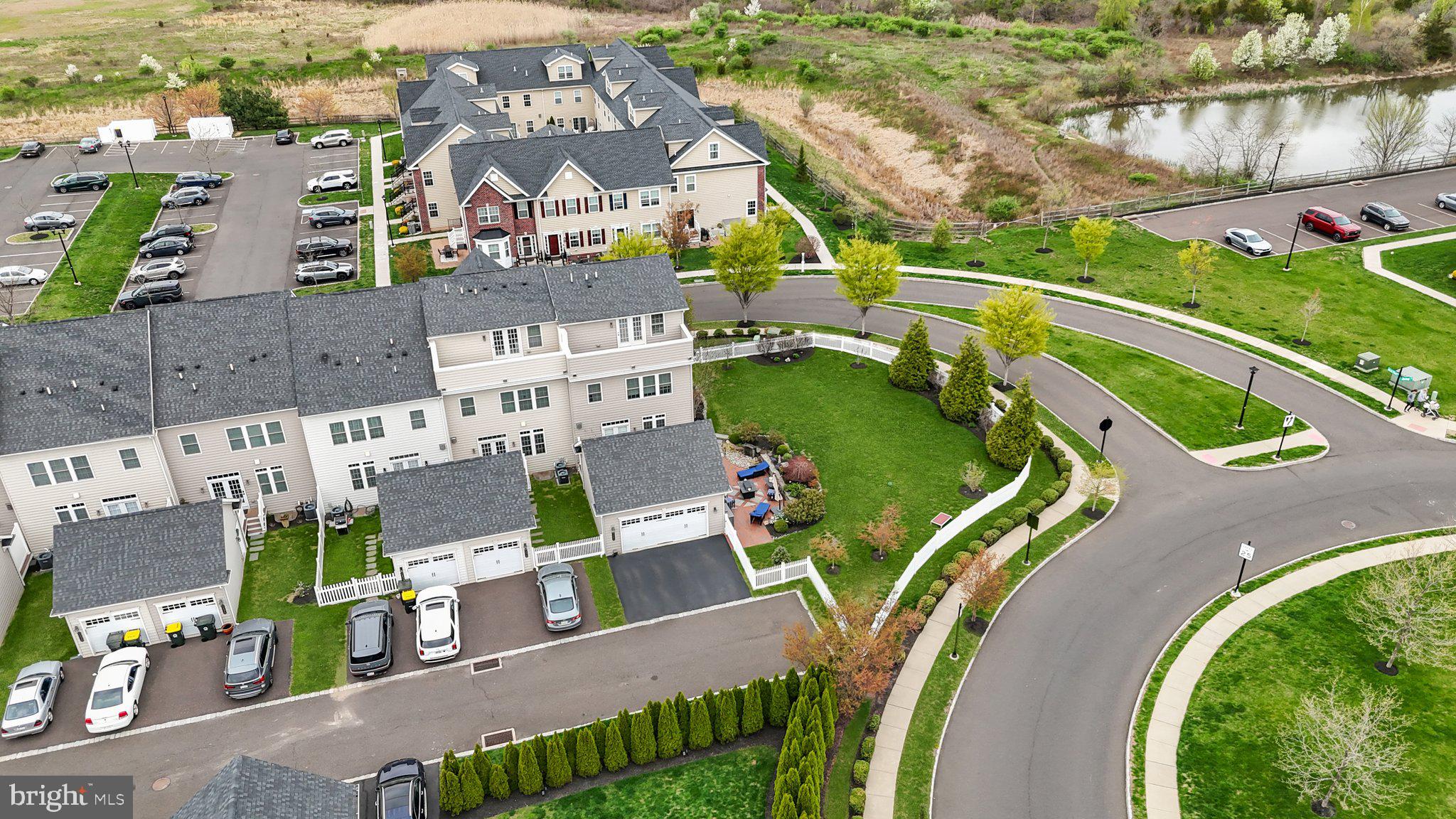 3842 Jacob Stout Road Doylestown, PA 18902 - Photo 62 of 68 an aerial view of a house with outdoor space and a lake view
