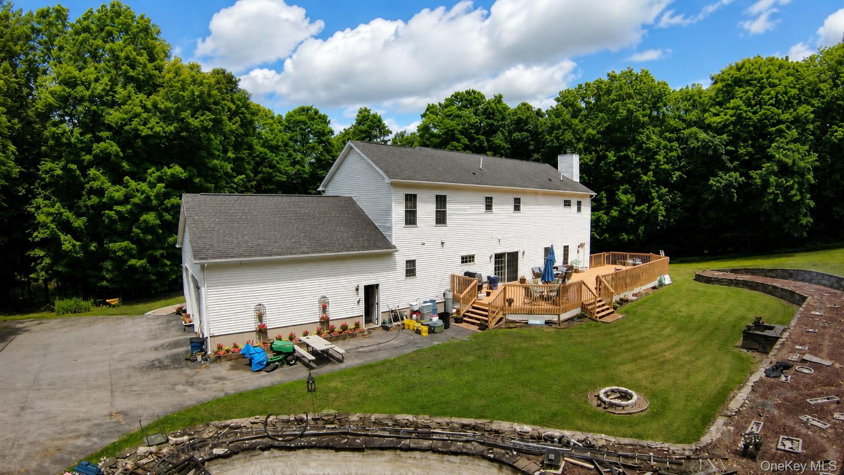 411 Mt Joy Road Middletown, NY 10941 - Photo 5 of 49 Back yard with large deck and stone walls throughout