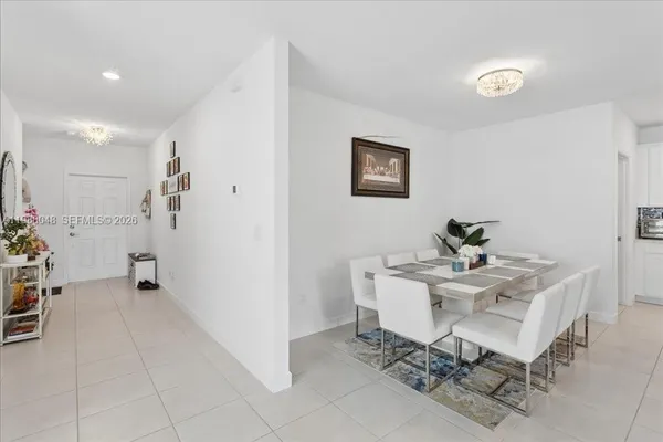 a workspace with furniture and white walls
