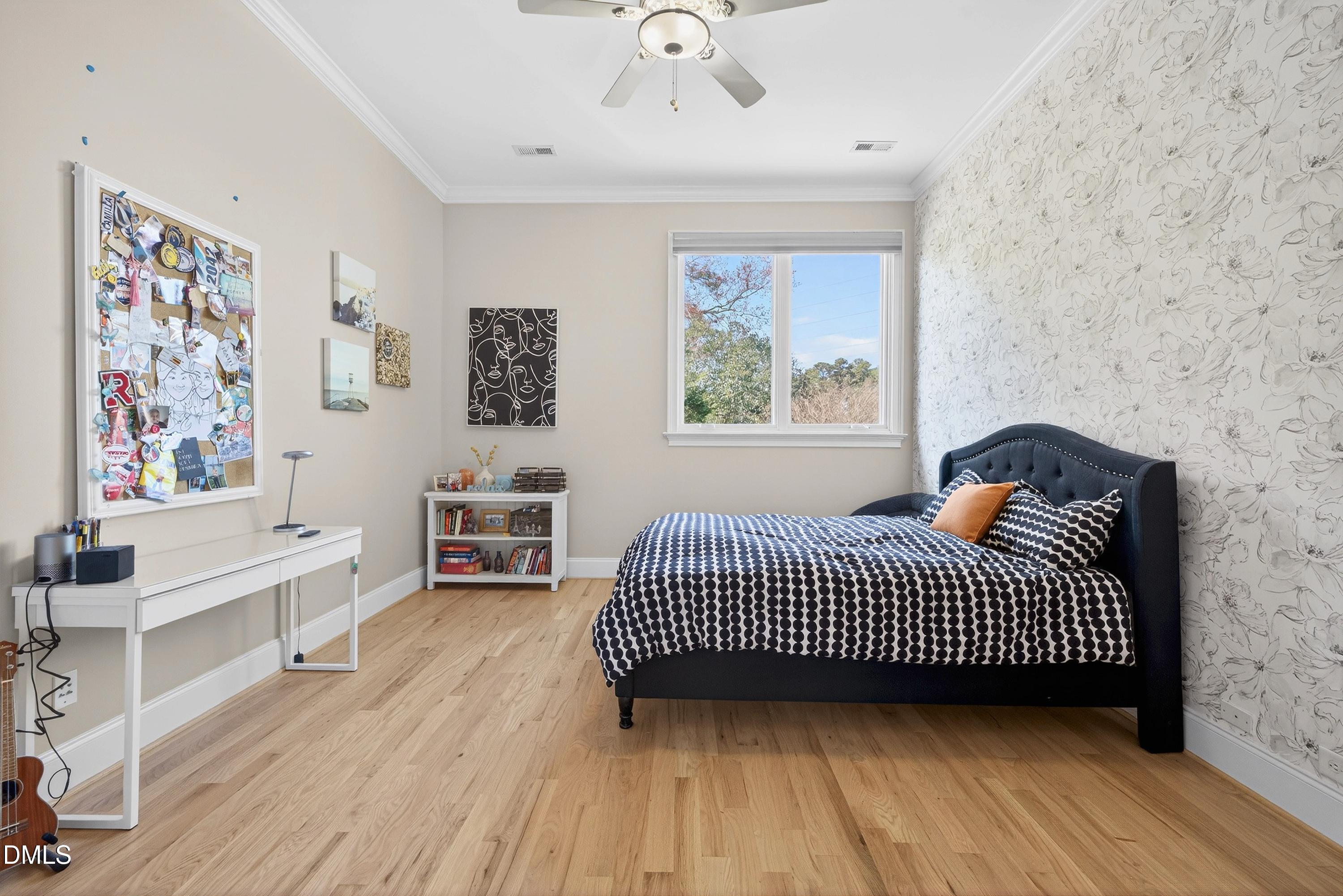 6701 Foxfire Place Raleigh, NC 27615 - Photo 46 of 67 a view of a bedroom with furniture and wooden floor