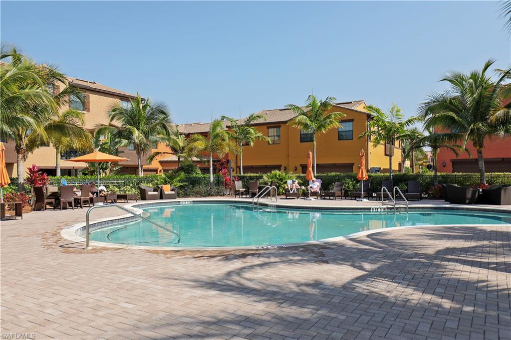 9051 Capistrano Street North, Unit 4308 Naples, FL 34113 - Photo 14 of 20 a view of swimming pool