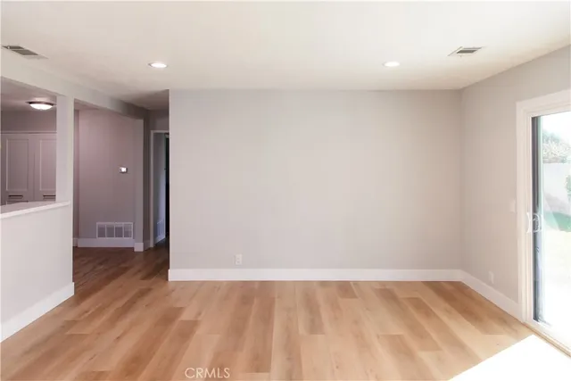 a bathroom with a granite countertop shower