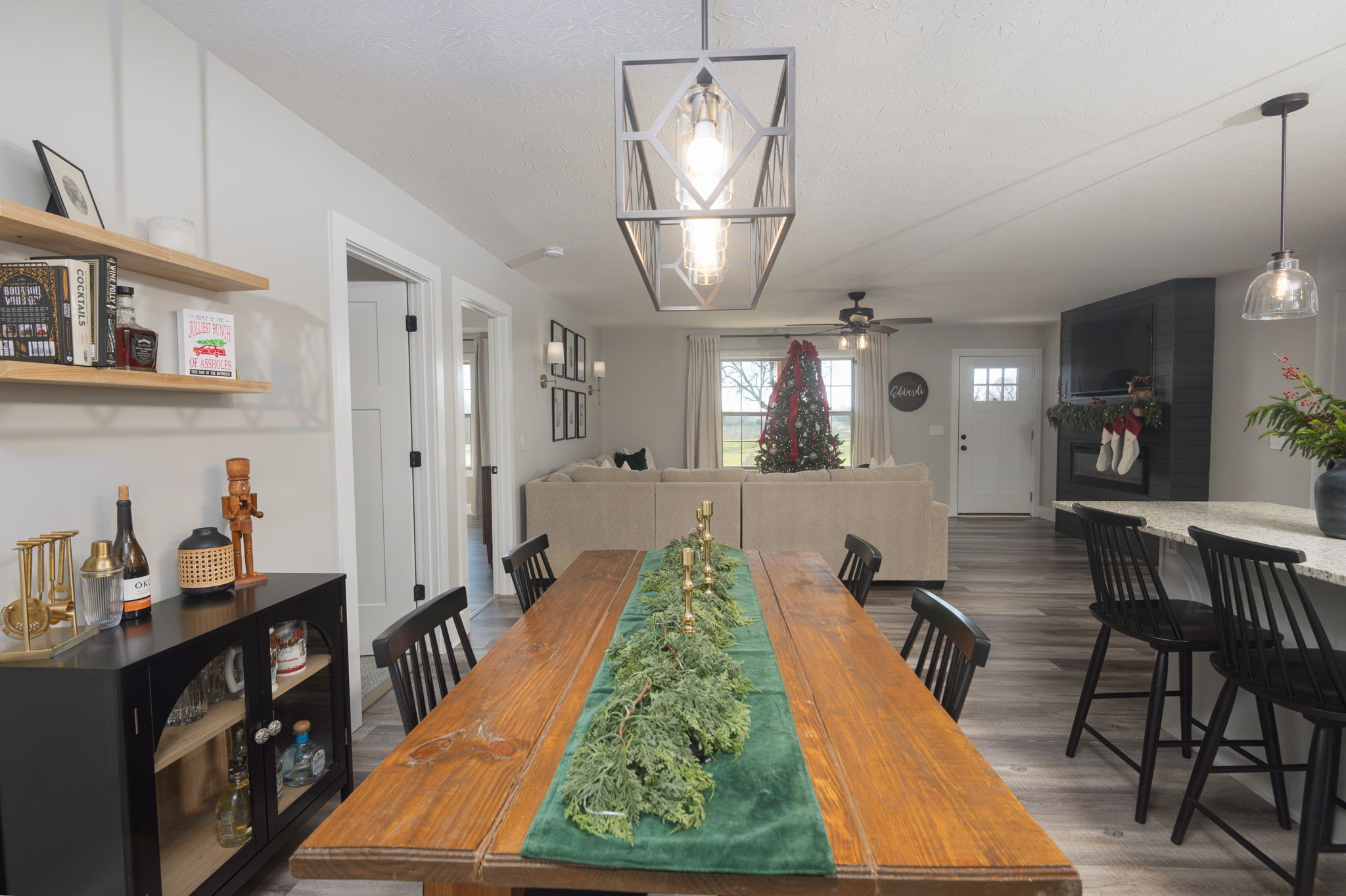 720 Armstrong Road Castalian Springs, TN 37031 - Photo 12 of 45 an open kitchen with dining table and chairs