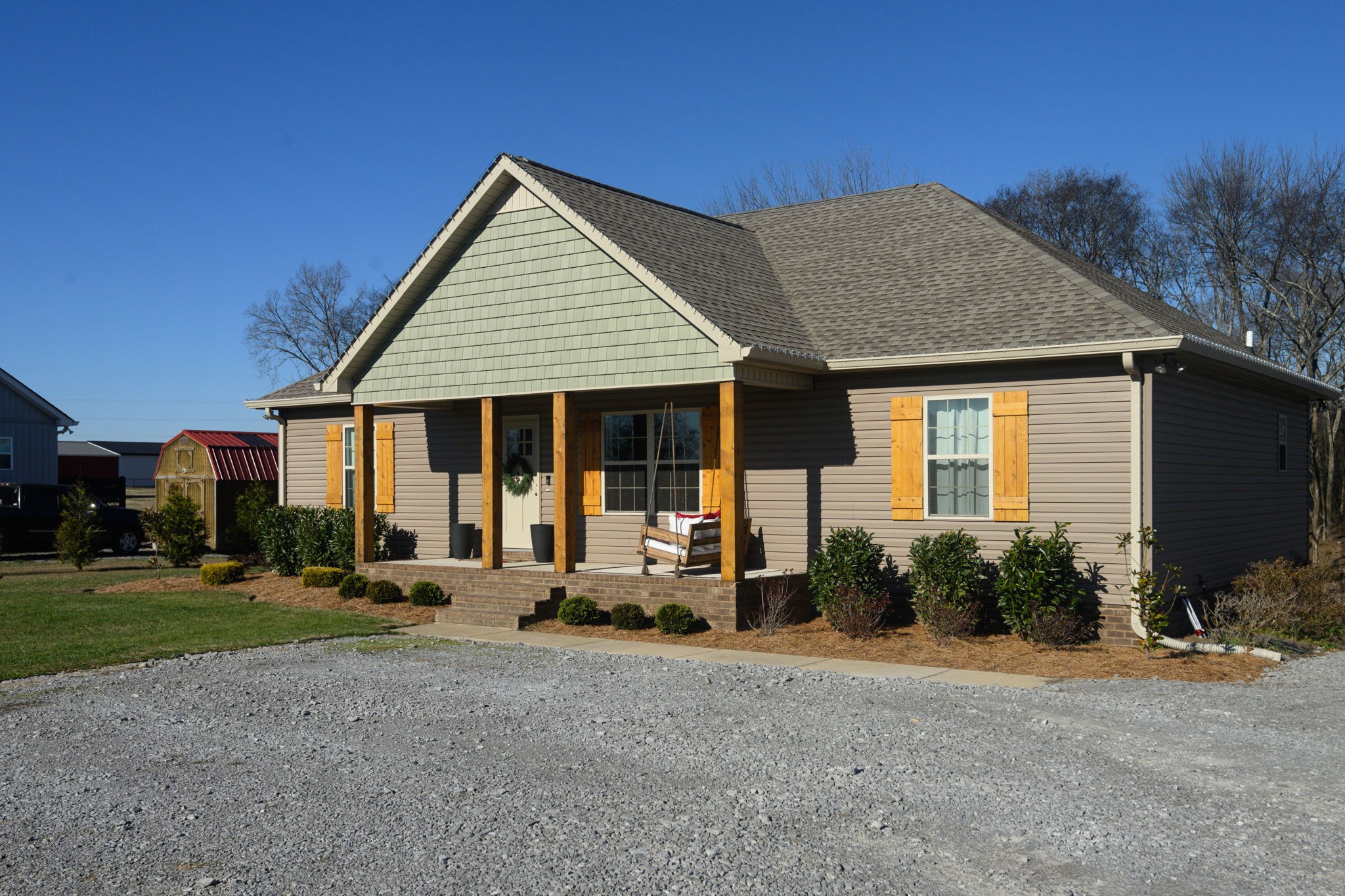 720 Armstrong Road Castalian Springs, TN 37031 - Photo 2 of 45 a front view of a house with garden