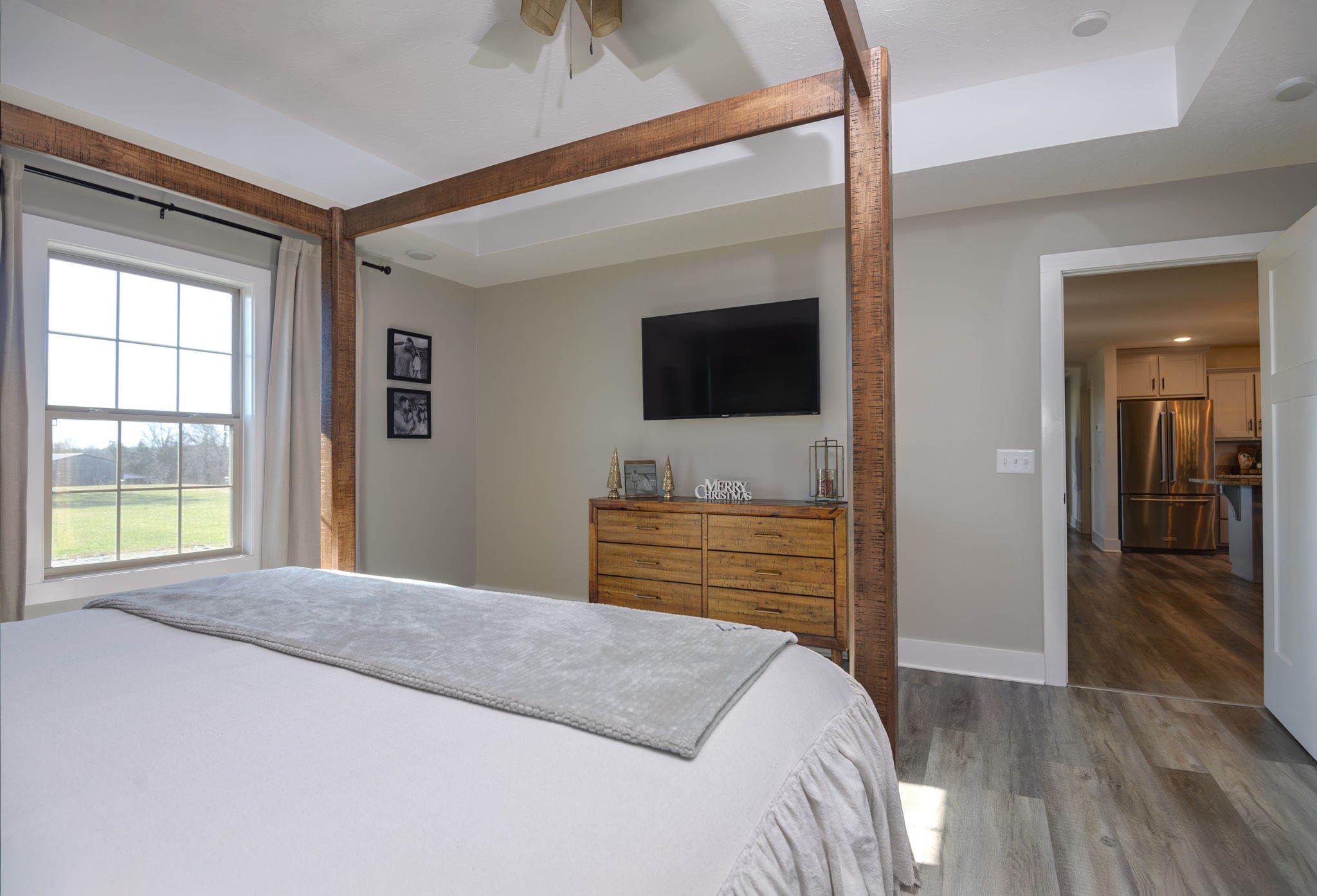 720 Armstrong Road Castalian Springs, TN 37031 - Photo 21 of 45 a bedroom with a bed and a flat screen tv