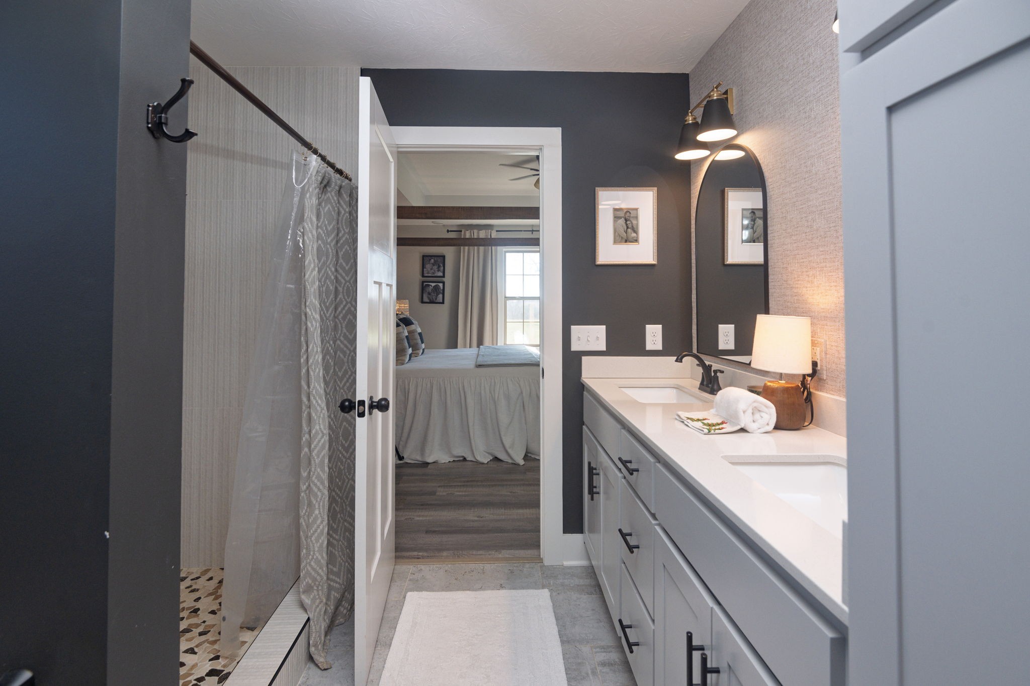 720 Armstrong Road Castalian Springs, TN 37031 - Photo 23 of 45 a bathroom with a double vanity sink and a mirror