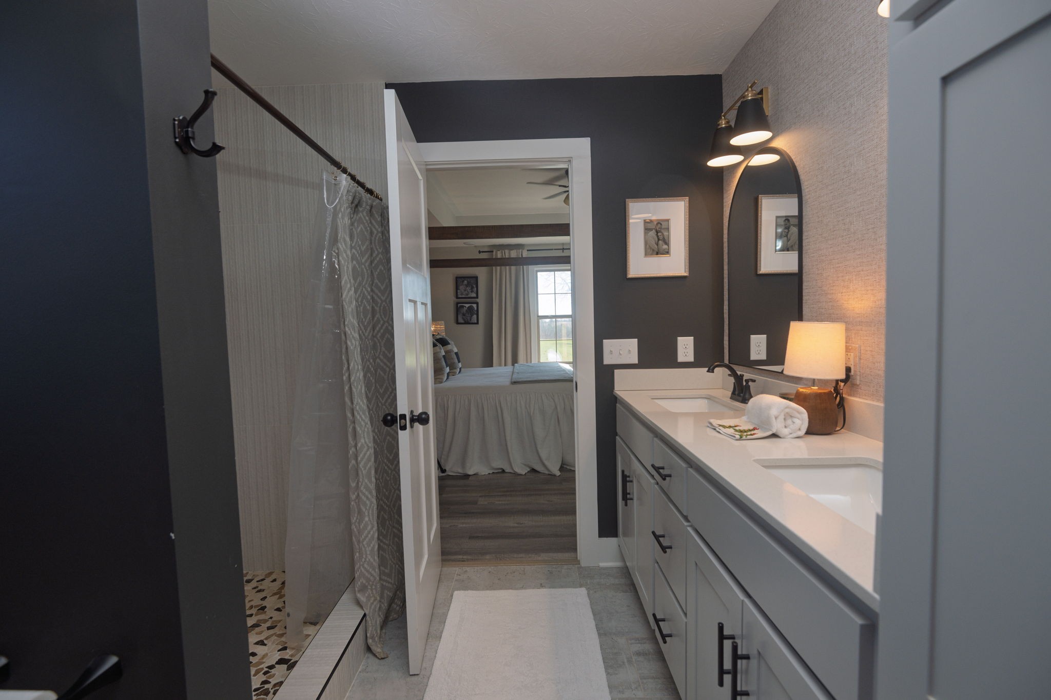 720 Armstrong Road Castalian Springs, TN 37031 - Photo 25 of 45 a bathroom with a double vanity sink and a mirror