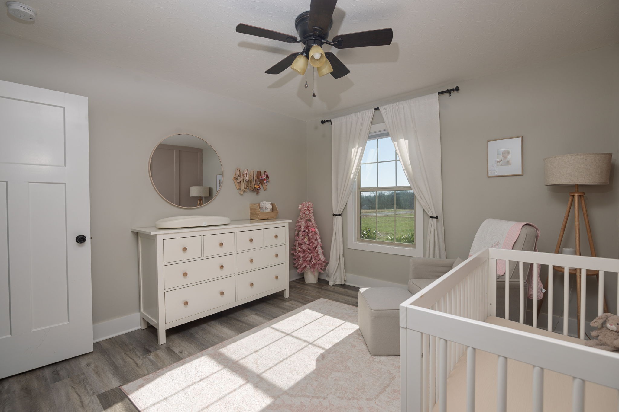 720 Armstrong Road Castalian Springs, TN 37031 - Photo 30 of 45 a bedroom with a bed and a dresser in it