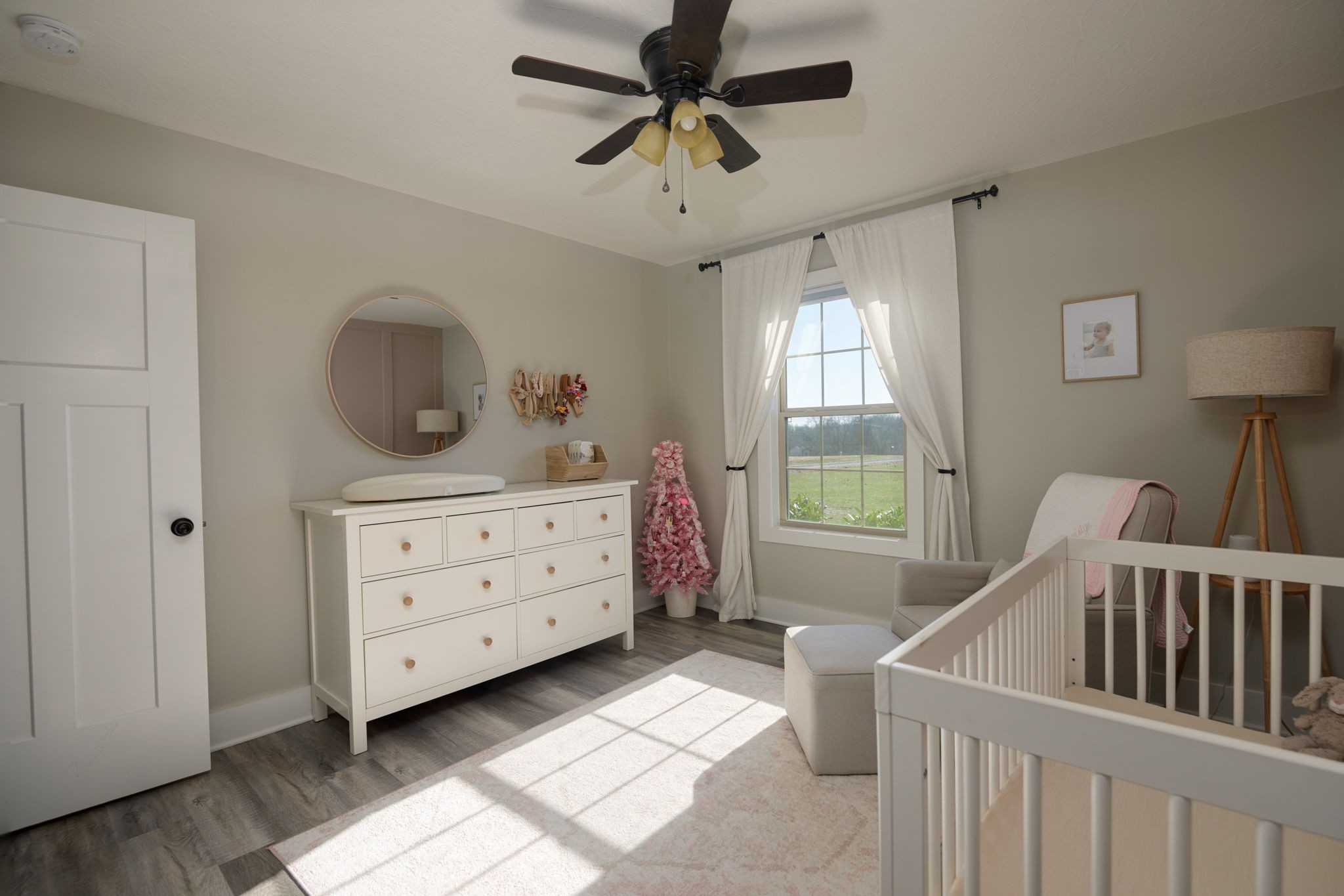 720 Armstrong Road Castalian Springs, TN 37031 - Photo 31 of 45 a bedroom with a bed and a window