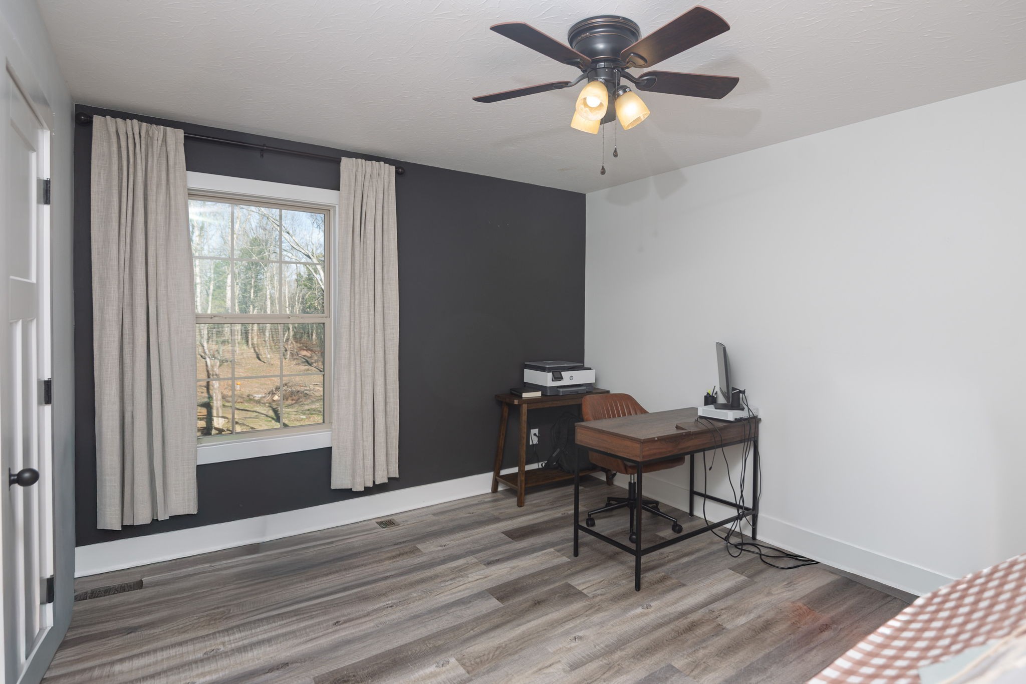 720 Armstrong Road Castalian Springs, TN 37031 - Photo 34 of 45 a view of a workspace with furniture and a window
