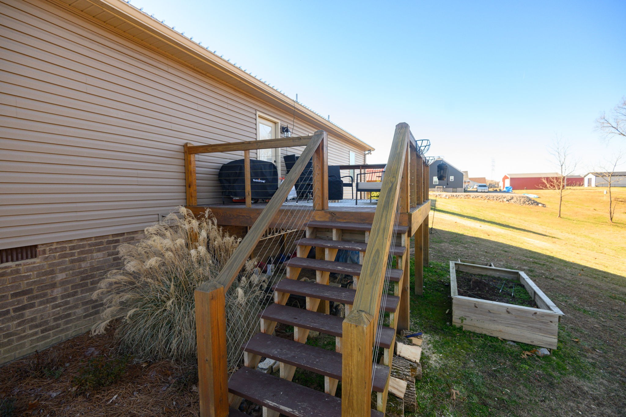 720 Armstrong Road Castalian Springs, TN 37031 - Photo 40 of 45 a view of a house with backyard and trees