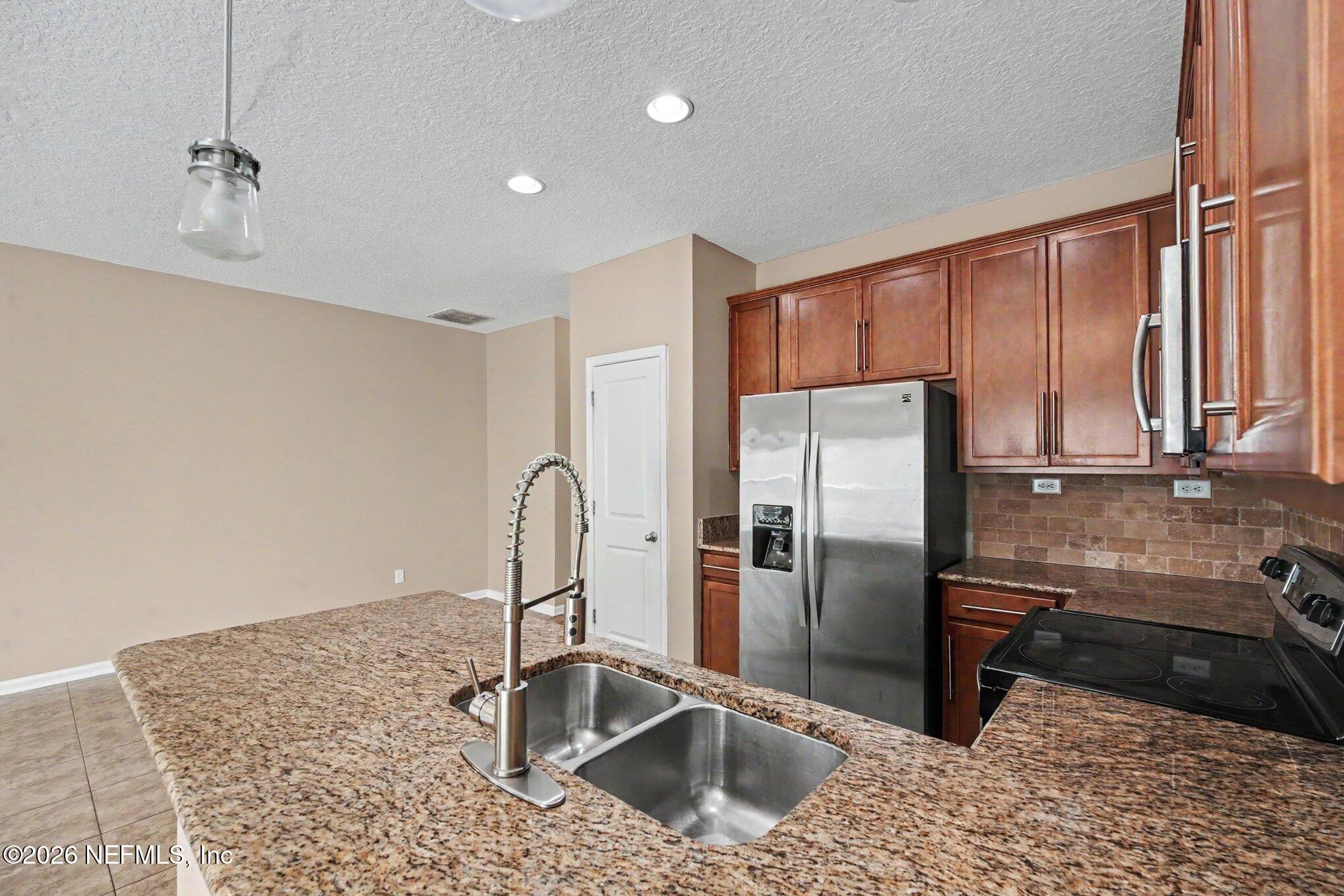 1591 Landau Road Jacksonville, FL 32225 - Photo 11 of 34 008_file_9034