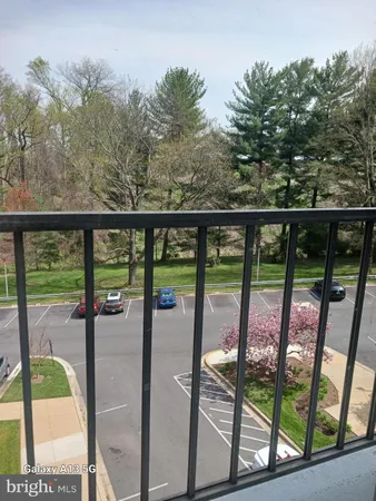 a view of balcony with yard