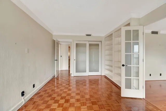 a bath tub sitting next to a shower