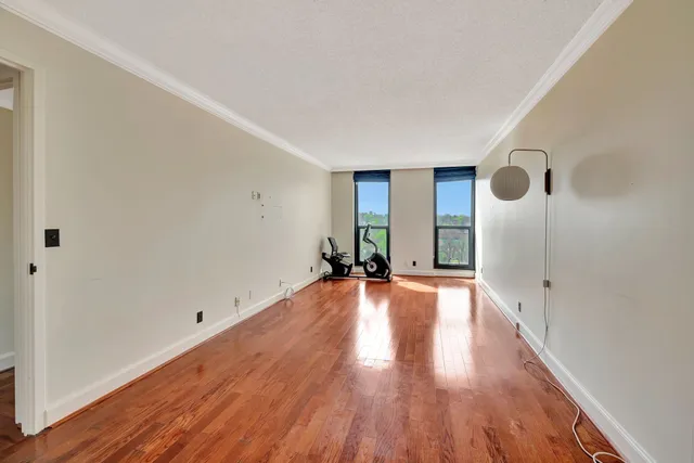 a spacious bathroom with a double vanity sink mirror and bathtub