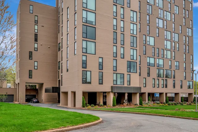 a view of a building with a yard