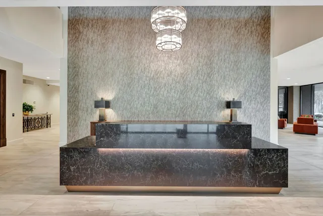 a view of living room with couch and window