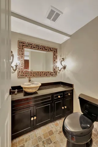 a bathroom with a sink and a toilet