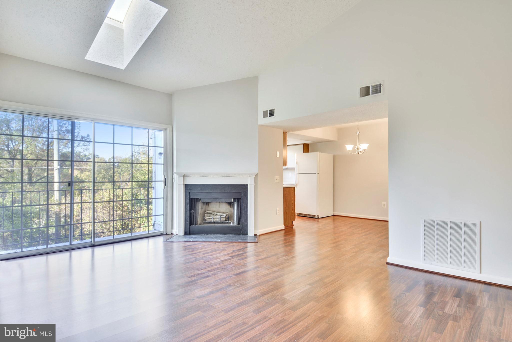 127 Fort Evans Road Southeast, Unit F Leesburg, VA 20175 - Photo 2 of 21 Vaulted Ceiling and Skylight
